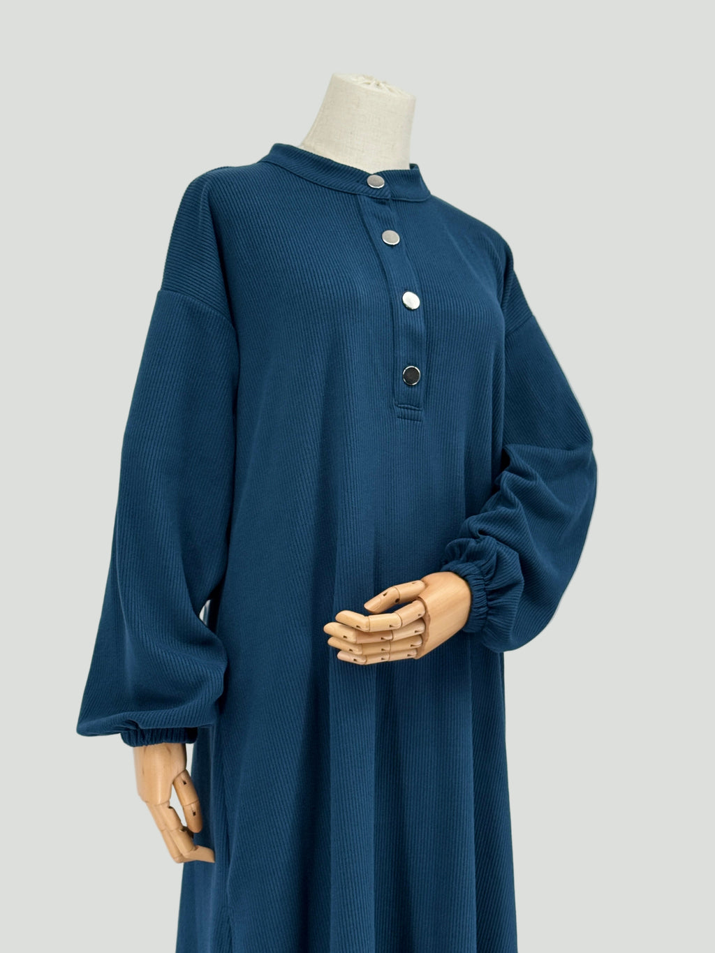 long blue ribbed matching set on a mannequin against a white background