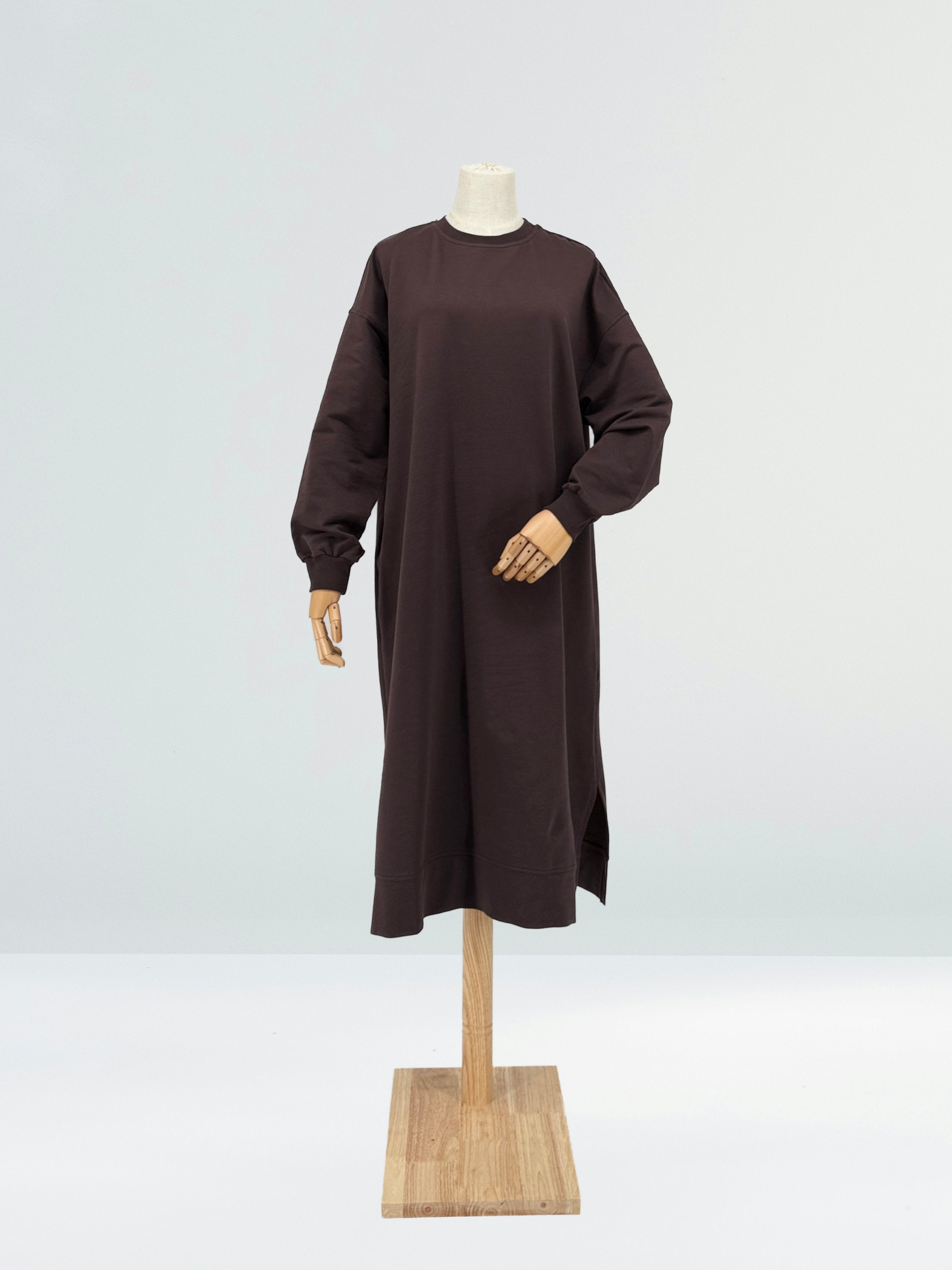 Brown long-sleeve tunic on a mannequin against a white background