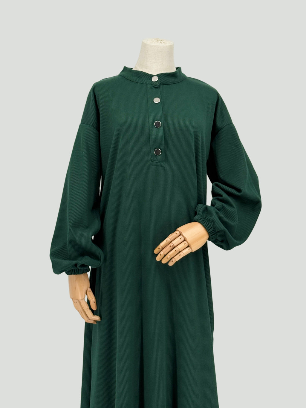 long green ribbed matching set on a mannequin against a white background