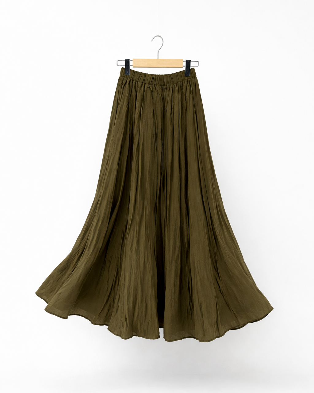 Long olive green crinkle skirt on a hanger against a white background