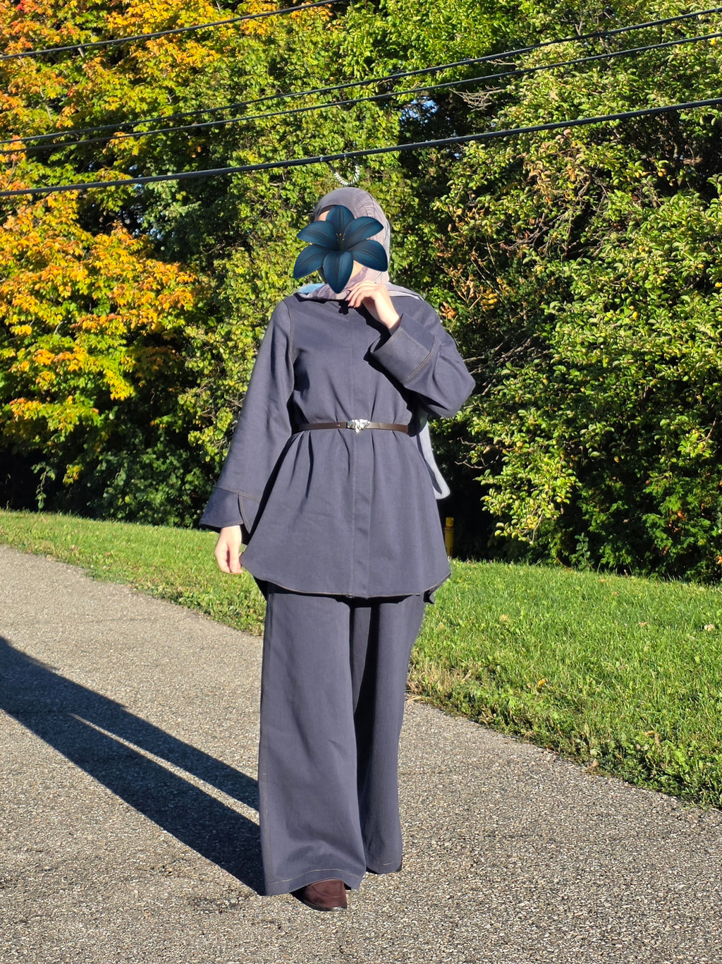 Model wearing Ayla Dusty Navy modest two-piece set with a long tunic and wide-leg pants.